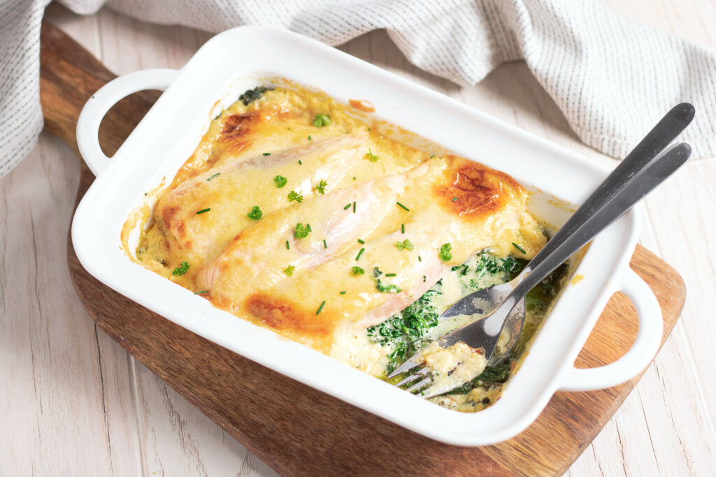 a white dish with food in it